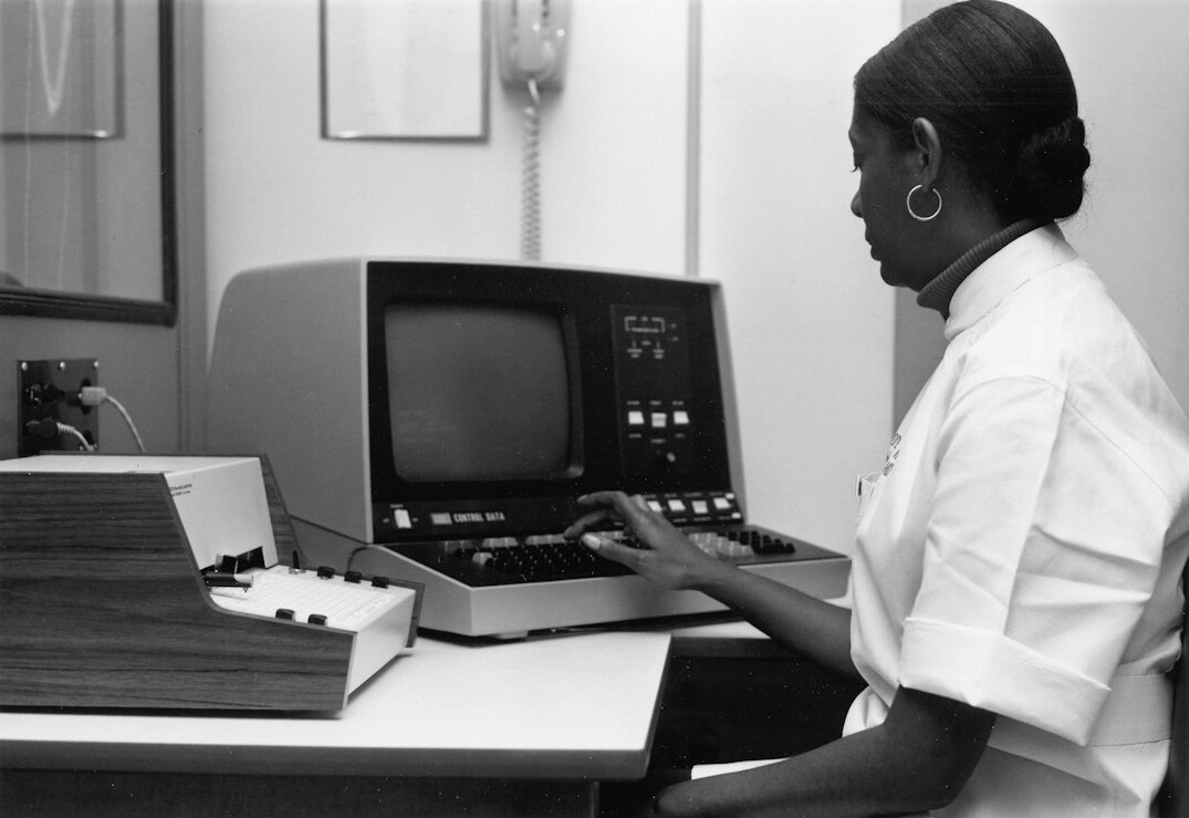 fact checker at computer